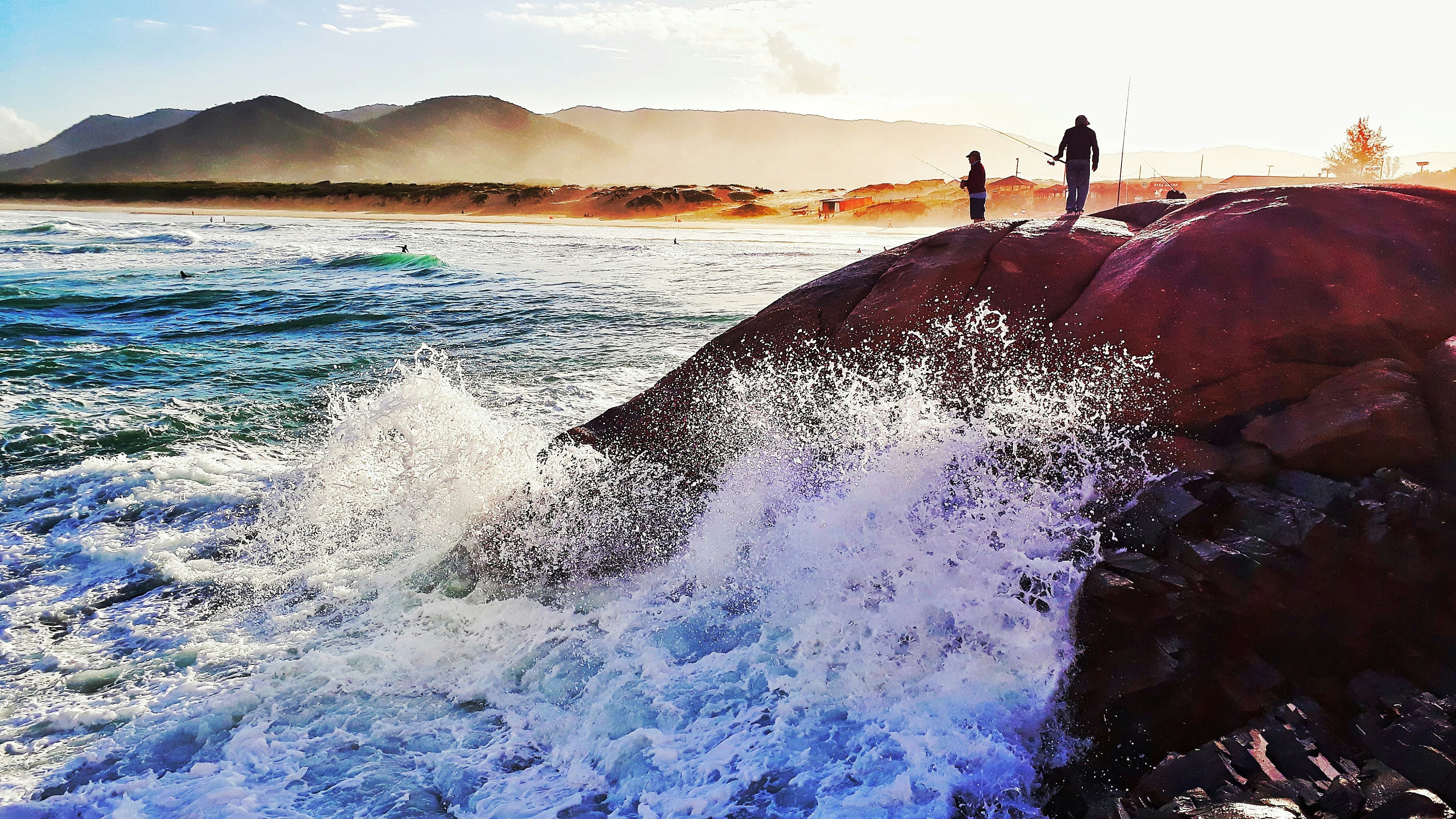 Surfing at Praia da Joaquina, Florianópolis, Brazil