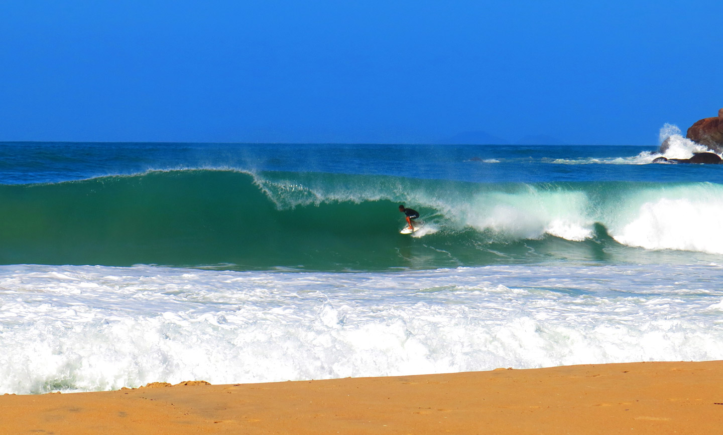 Surfing at Ubatuba (Praia Grande), São Paulo, Brazil