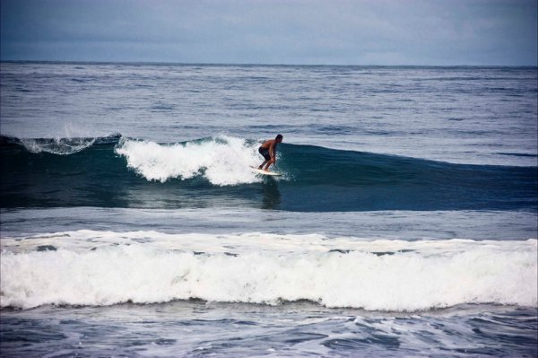 Surfing at El Valle (Chocó), Bahía Solano, Colombia