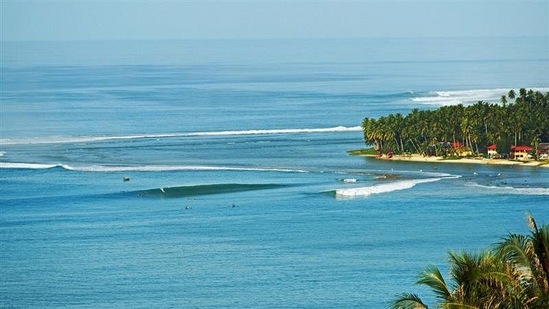 Surfing at Sorake Beach (Nias), Nias, Indonesia