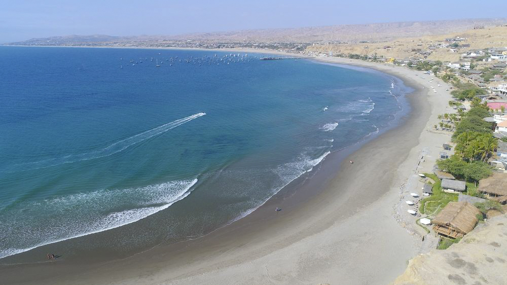 Surfing at Órganos, Piura, Peru