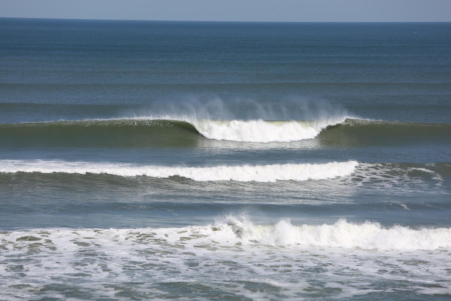 Surfing at New Smyrna Beach, Florida, USA