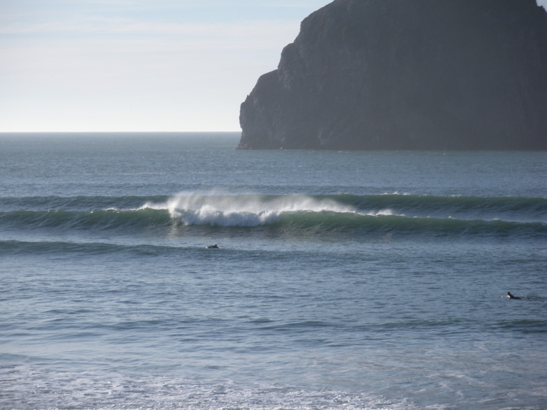 Surfing at Pacific City (Cape Kiwanda), Oregon, USA