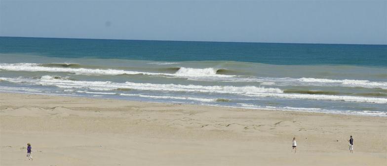 Surfing at South Padre Island, Texas, USA
