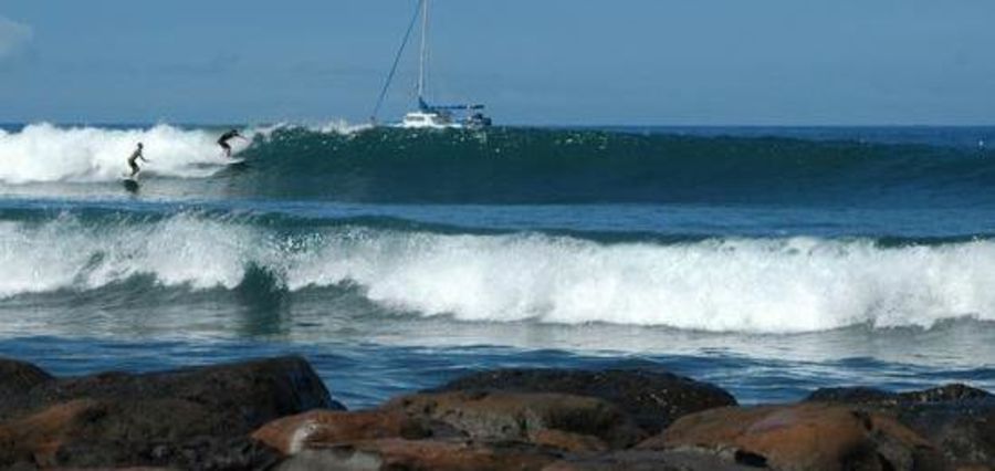Surfing at Lahaina (Breakwall), Maui, USA